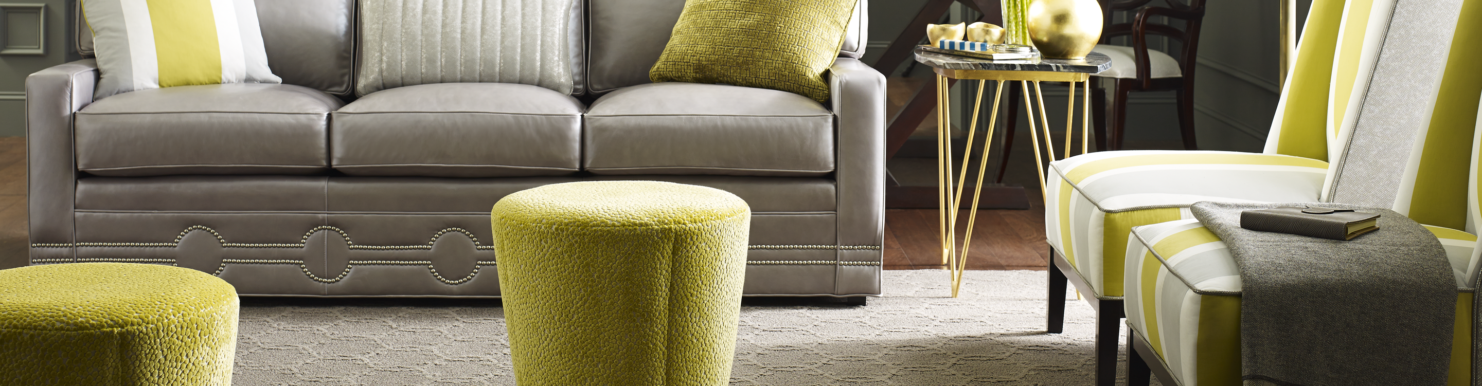 beige textured carpet in living space with lime green and grey furniture