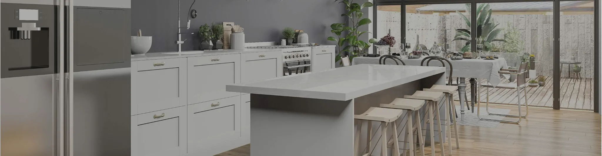 White countertops in a kitchen with wood-look flooring