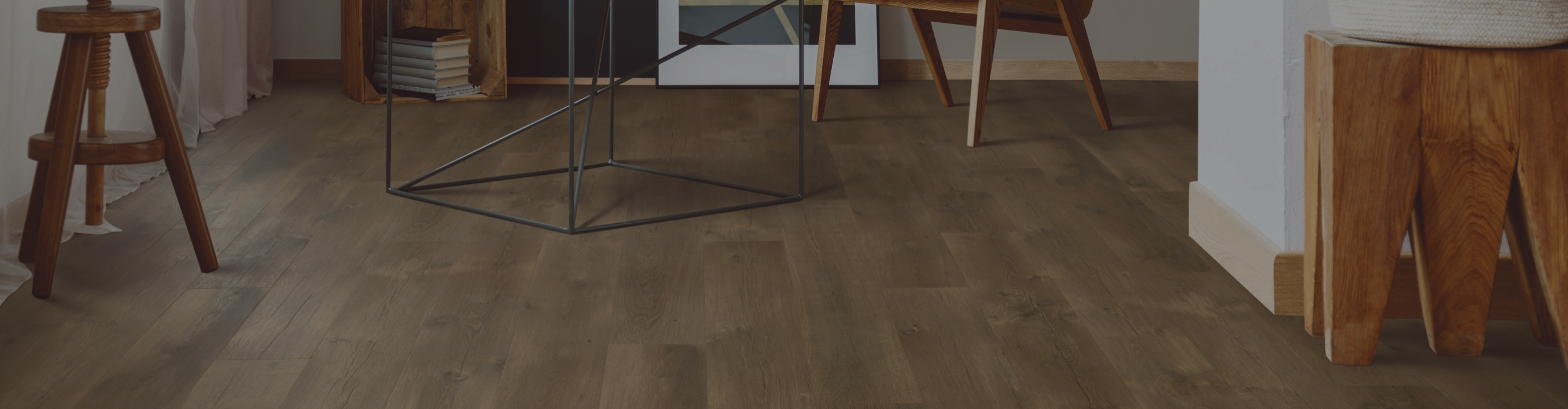 Laminate flooring in living room with furniture and fireplace