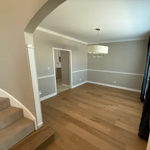 Oak hardwood flooring and stairs by Carpet One DFW