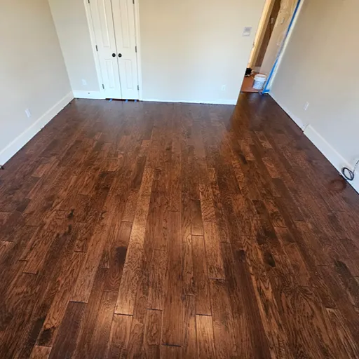 Dark hardwood flooring installation by Carpet One DFW