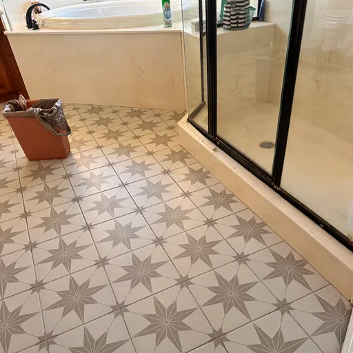 Star pattern tile flooring bathroom installation custom shower